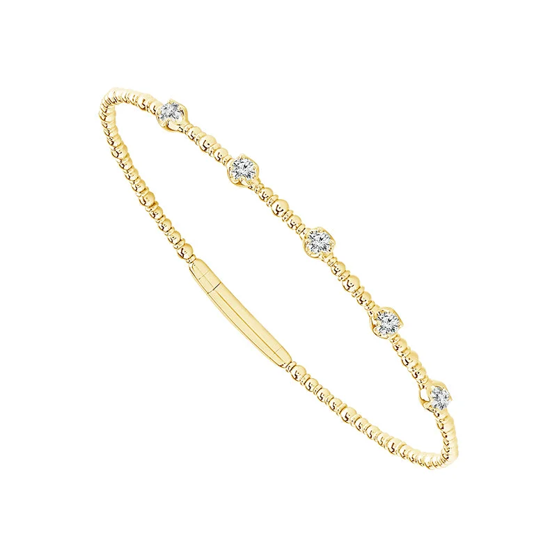 ladies-birthstone-wrap-bracelets-1/3 Ctw Flexible Diamond Station Bangle Bracelet in Yellow Gold