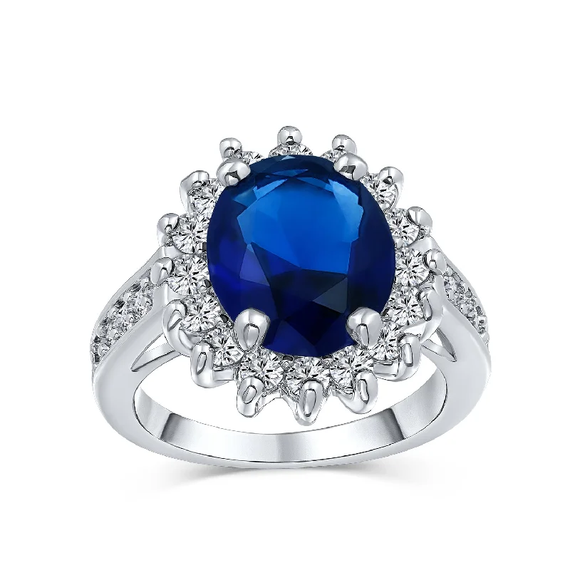 Ladies engagement rings cool vows -Classic 5CTW Royal Blue CZ Halo Oval Simulated Sapphire Engagement Ring Silver