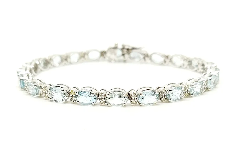 ladies-star-open-cuff-bracelets-AQUAMARINE AND DIAMOND TENNIS BRACELET AD NO.2751