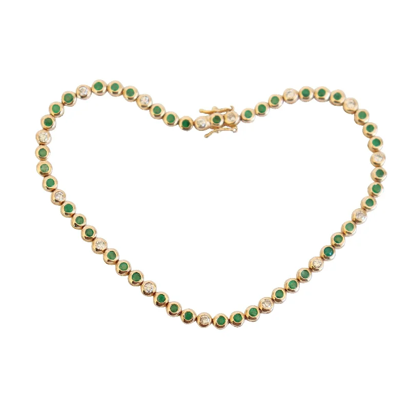 ladies-classic-rope-bracelets-Yellow Gold Emerald and Diamond Bezel-set Tennis Bracelet