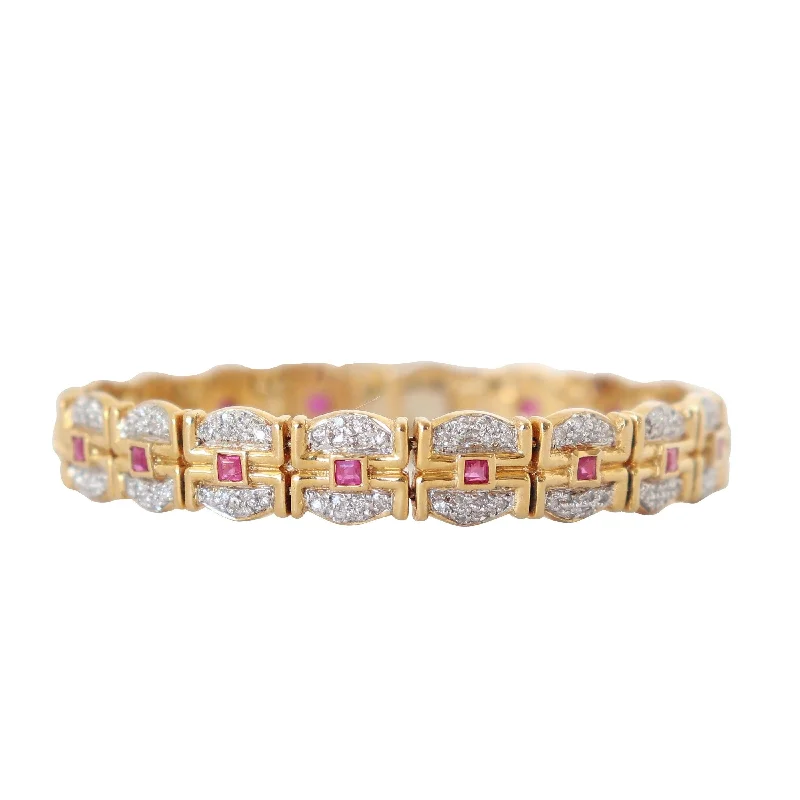 ladies-bridal-twist-bracelets-18 kt Yellow Gold Bracelet with Diamonds and Rubies