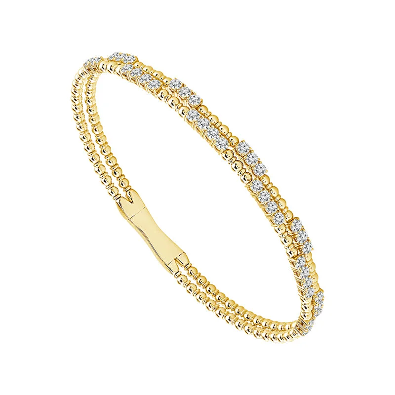 ladies-flower-twist-bracelets-1 1/3 Ctw Double Row Flexible Diamond Bangle Bracelet in 14 Karat Yellow Gold