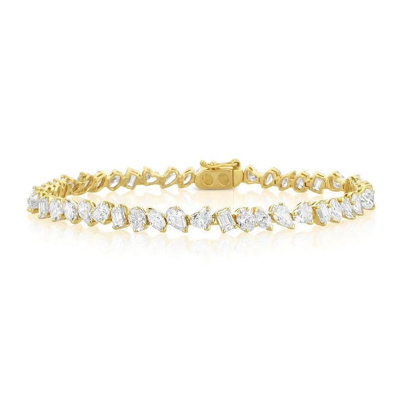 ladies-rustic-gold-bracelets-9.15 Carat Mixed Fancy Shape Diamond Line Bracelet set in 18K Yellow Gold