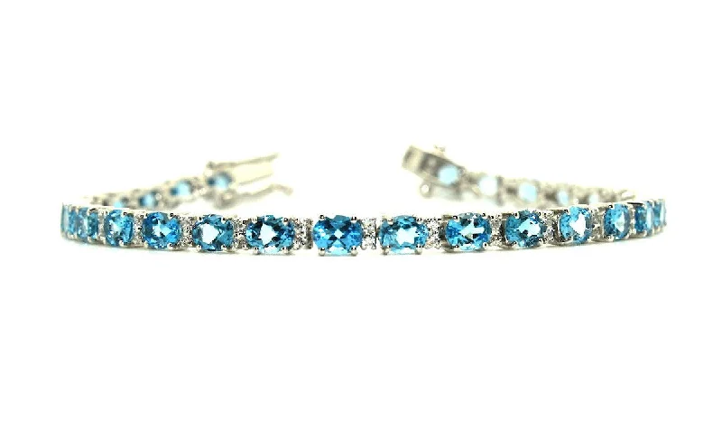 ladies-modern-rope-bracelets-Blue Topaz and Cubic Zirconia Bracelet in Sterling Silver