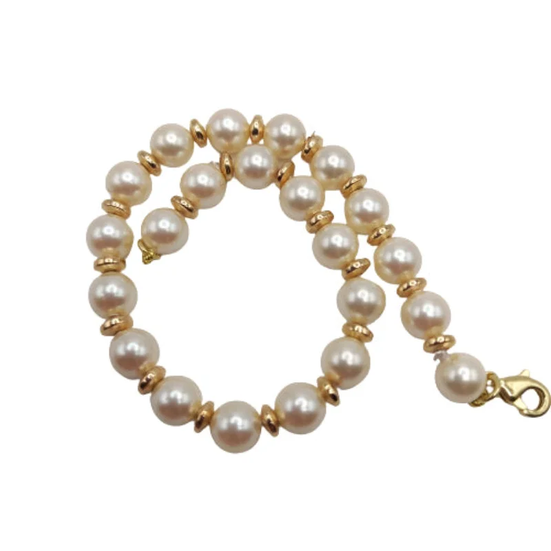 ladies-artisan-gold-bracelets-Pearls and Gold Bracelet