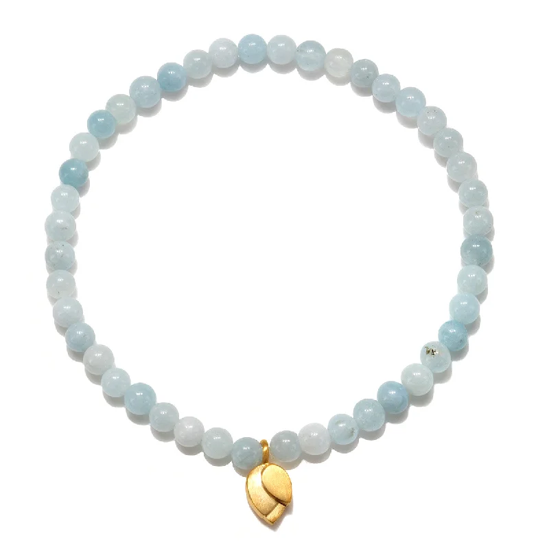 ladies-minimalist-diamond-bracelets-Tranquil Journey Lotus Aquamarine Gemstone Bracelet