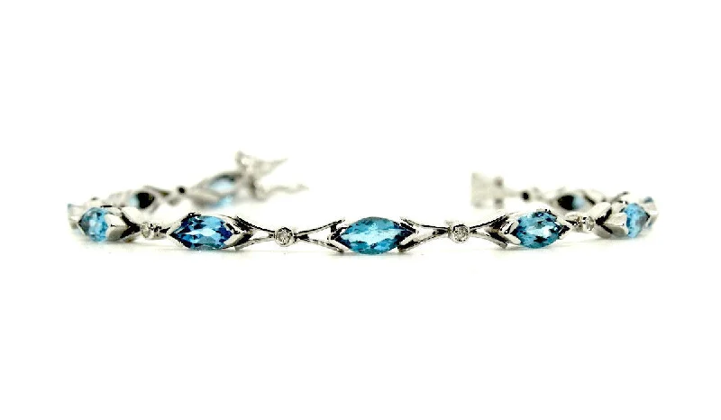 ladies-party-open-cuff-bracelets-Blue Topaz And Diamond Marquise Bracelet Ad No.1116