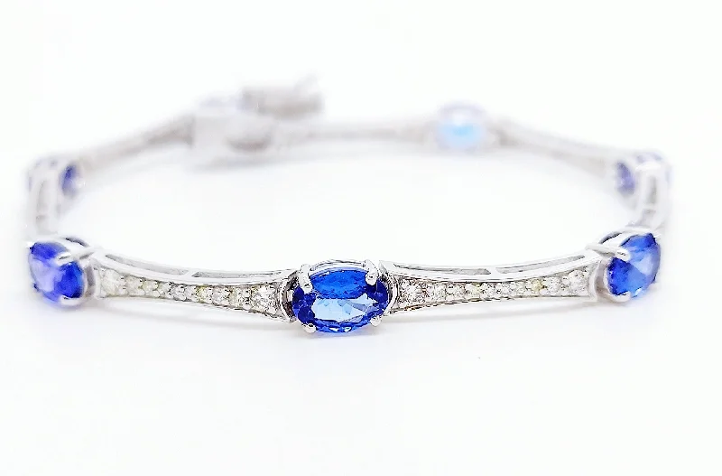 ladies-artisan-diamond-bracelets-Tanzanite And Diamond Station Bracelet In 14k White Gold AD NO # 2657