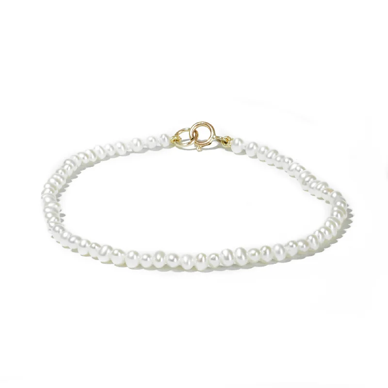 ladies-heart-braided-bracelets-Tiny Pearl Bracelet