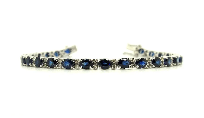 ladies-artisan-pearl-bracelets-Blue Sapphire And Diamond Tennis Bracelet Ad No.1057