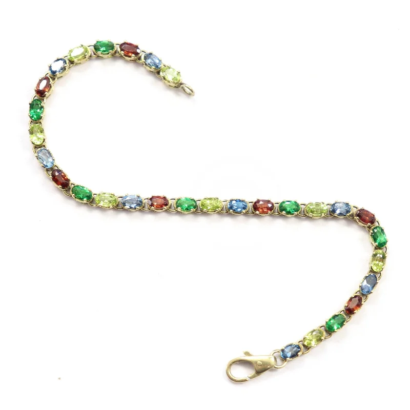 ladies-party-wrap-bracelets-Yellow Gold Peridot, Garnet and Topaz Bracelet