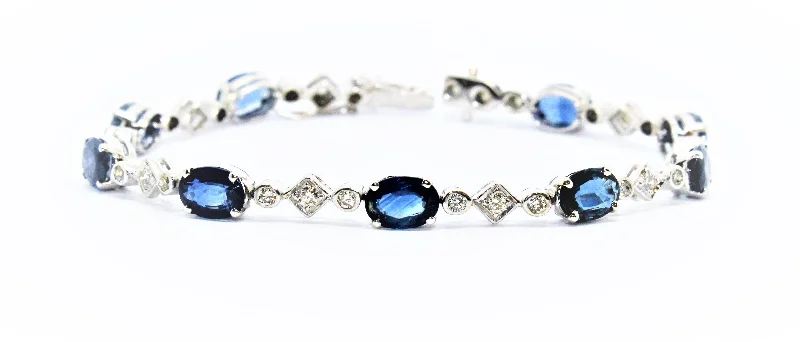 ladies-affordable-diamond-bracelets-BLUE SAPPHIRE AND DIAMOND STAR BRACELET AD NO.1622